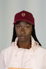 Sue Adinkra Cargo Cap Damen in Burgund